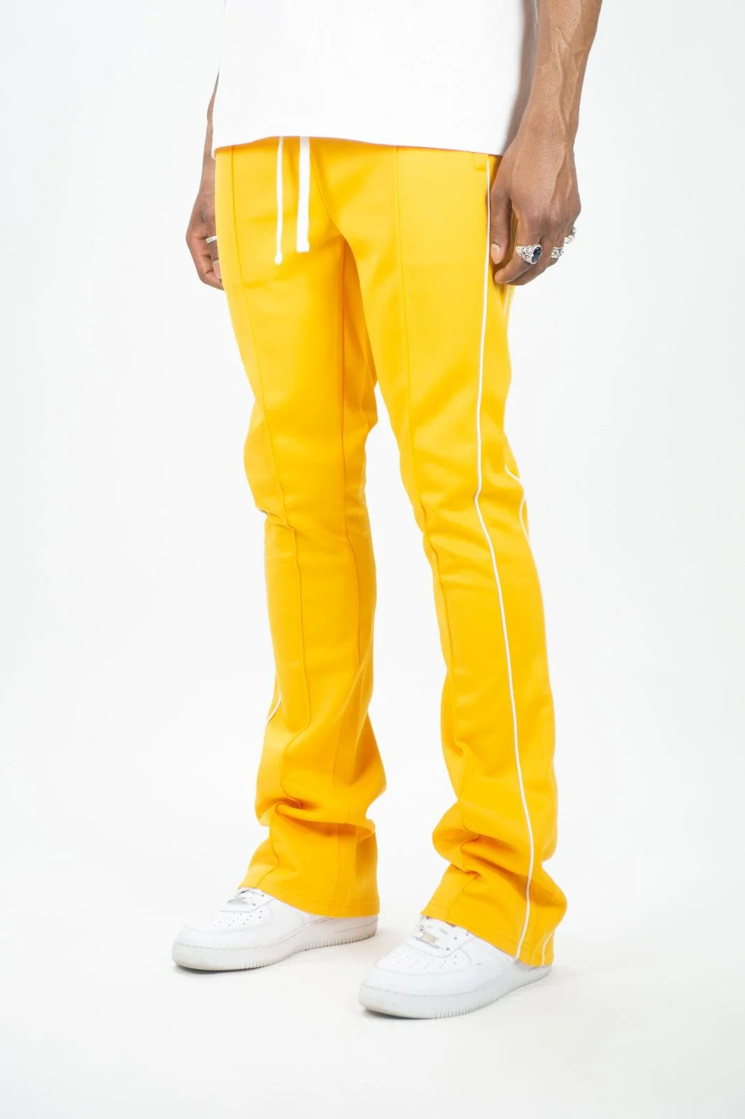 Rebel Minds / Ringspun yellow stacked fit track pants with white side stripes and drawstring.