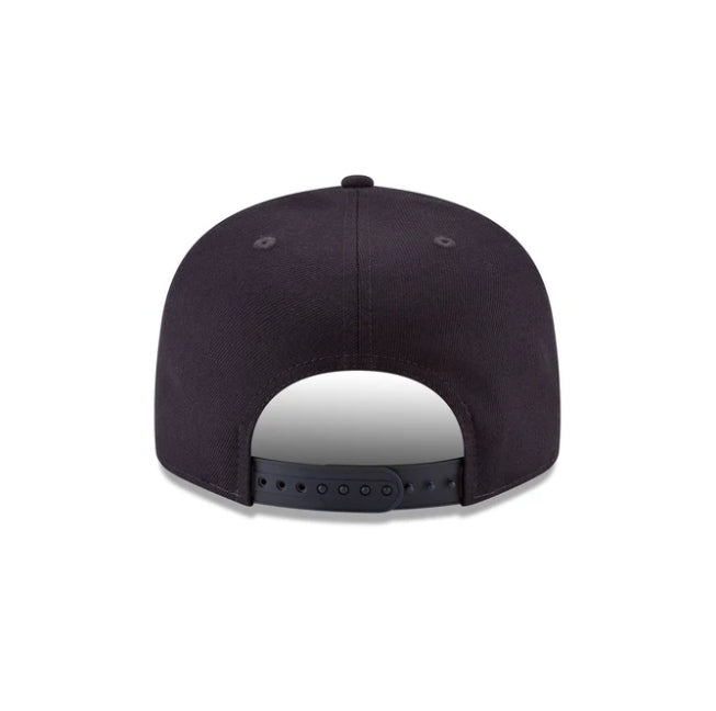 Rear view of a navy blue NEW ERA New York Yankees 9FIFTY snapback hat.