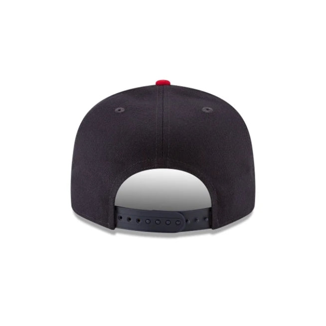 Back view of a navy blue NEW ERA Atlanta Braves 9FIFTY snapback hat.