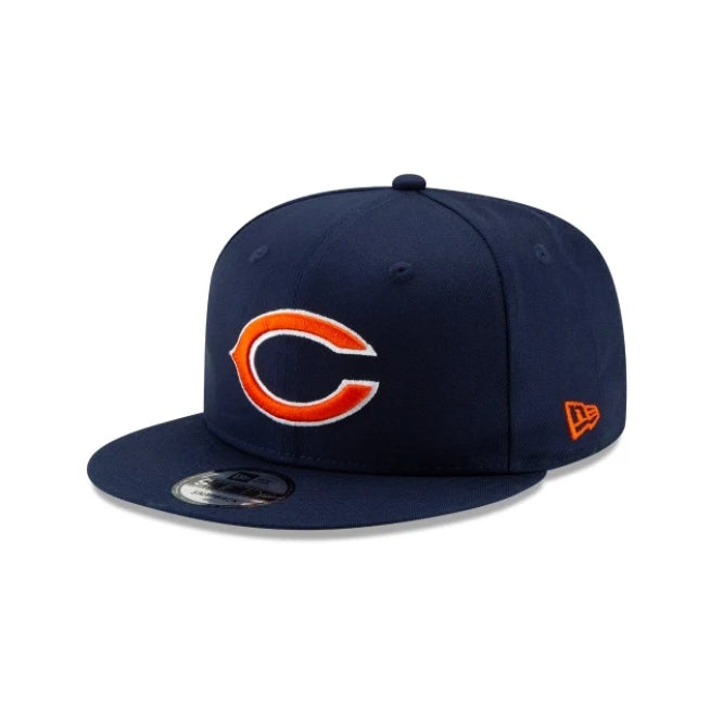 Navy blue NEW ERA Chicago Bears Basic 9FIFTY Snapback hat with orange and white logo.